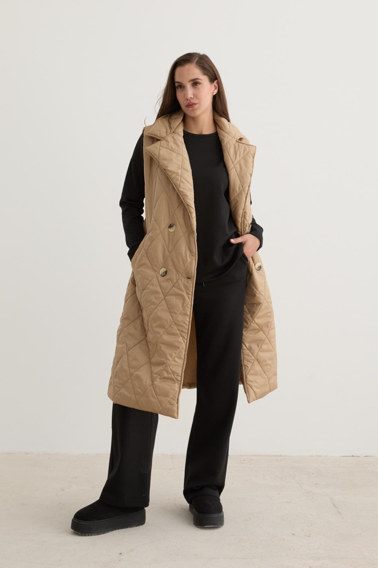 Quilted Vest With Button Front And Waist Belt Detail In