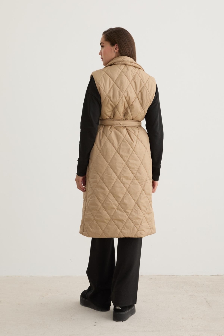 Quilted Vest With Button Front And Waist Belt Detail In