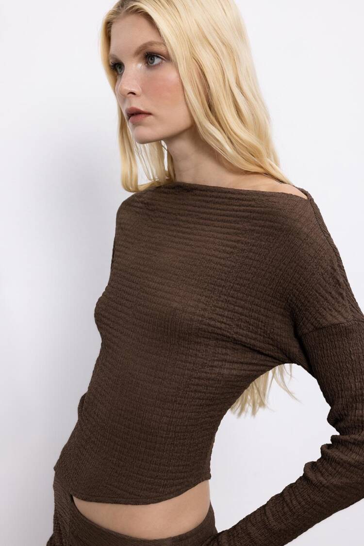 Asymmetric Cut Textured Top With Hem Detail
