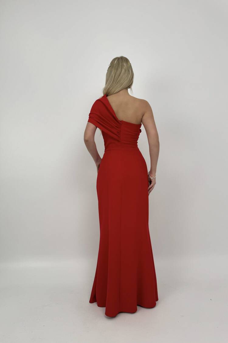Dress With A Brooch On The Shoulder