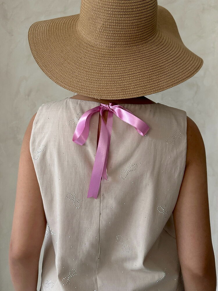 BowPrinted Sleeveless Blouse -|