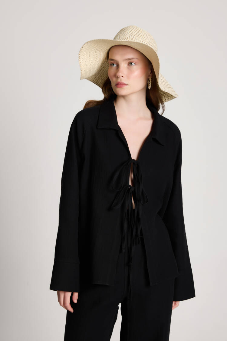 Suit With Notched Neck And Tie Closure