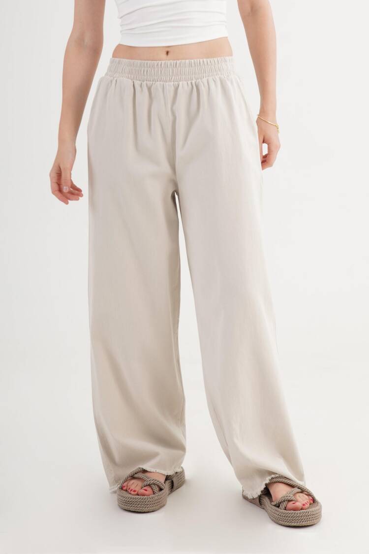 Beige Palazzo Pants With Wide Leg And Slant Pockets