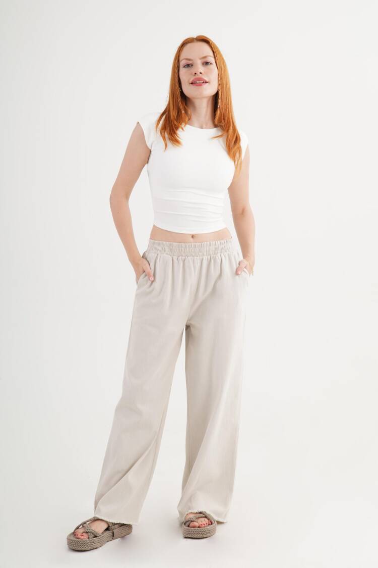 Beige Palazzo Pants With Wide Leg And Slant Pockets