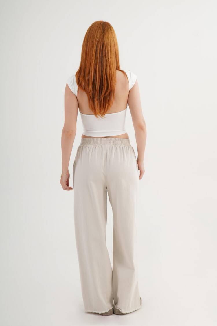 Beige Palazzo Pants With Wide Leg And Slant Pockets