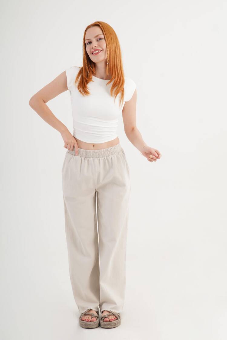 Beige Palazzo Pants With Wide Leg And Slant Pockets