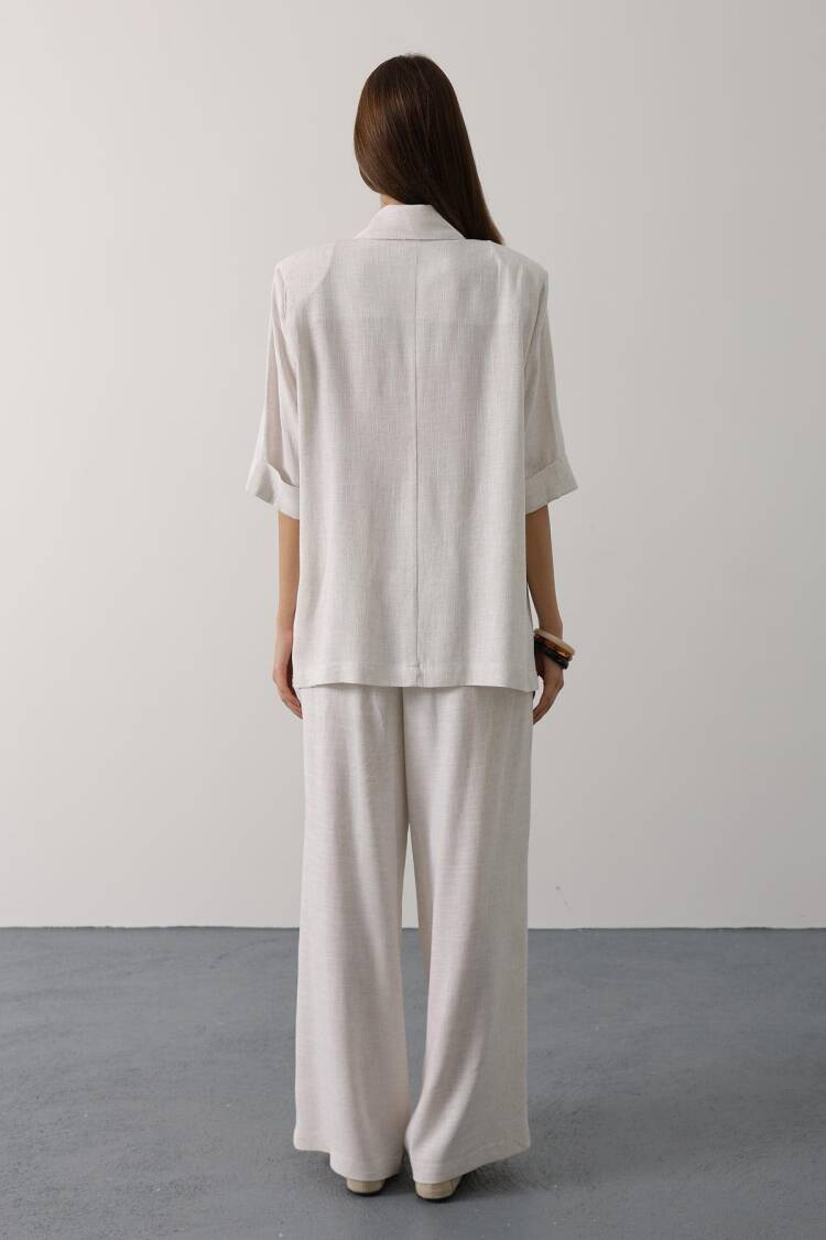 Elegant Beige Palazzo Pants With Wide Leg