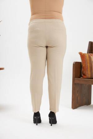 Beige Tapered Cropped Pants With Buttoned Closure