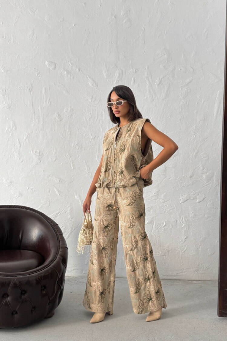 Beige Palazzo Pants With Floral Pattern And Drawstring