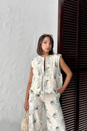 White Floral Zip-Up Sleeveless Shirt - Brand: Topshow - Women & Kids, Baby Clothes Wholesale - Globality Store