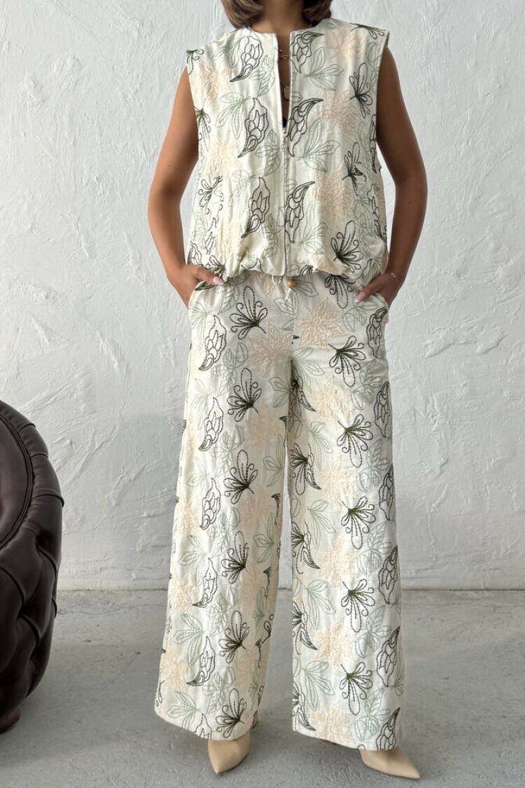 Beige Palazzo Pants With Floral Design