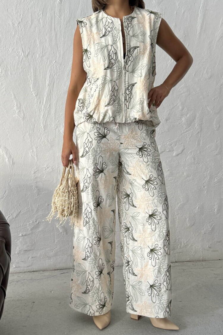 Beige Palazzo Pants With Floral Design