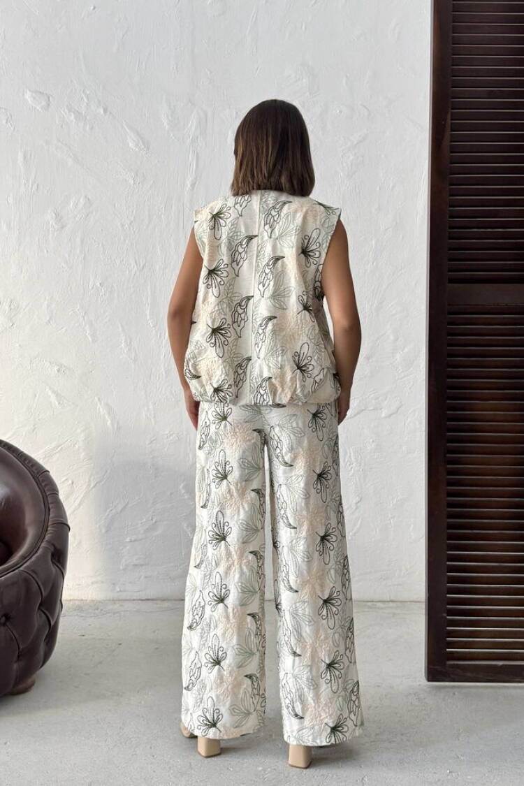 Beige Palazzo Pants With Floral Design
