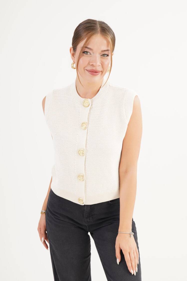 White Cardigan With Buttoned Closure And Cap Sleeves
