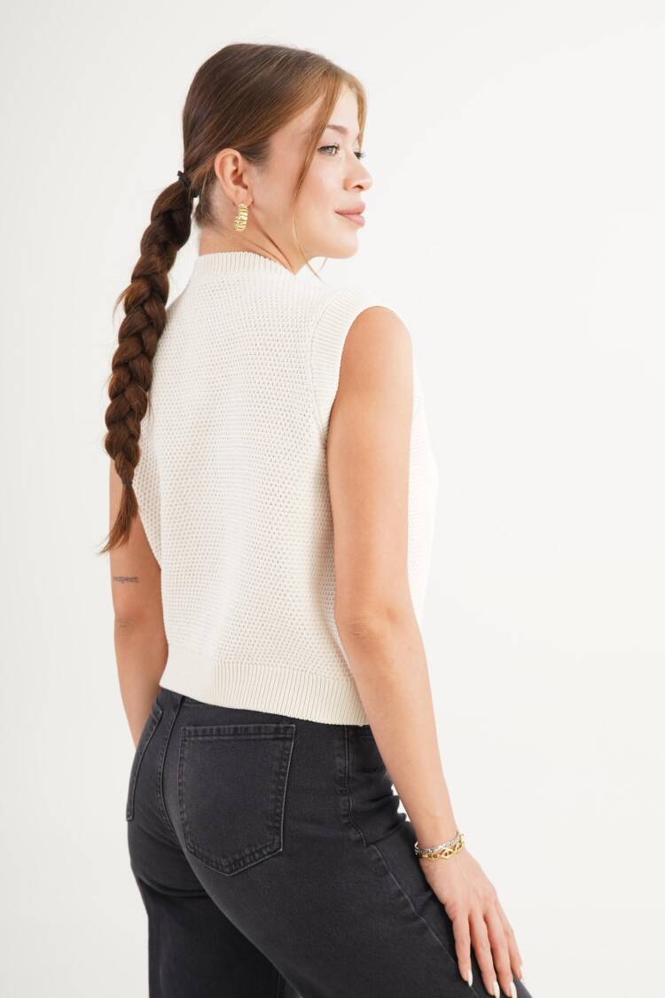 White Cardigan With Buttoned Closure And Cap Sleeves